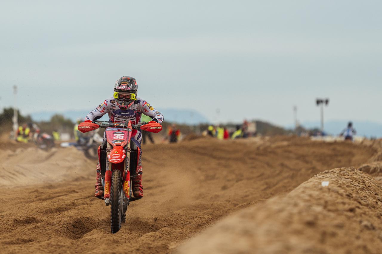 Mathilde Martinez rides a Honda with number 35 through deep sand